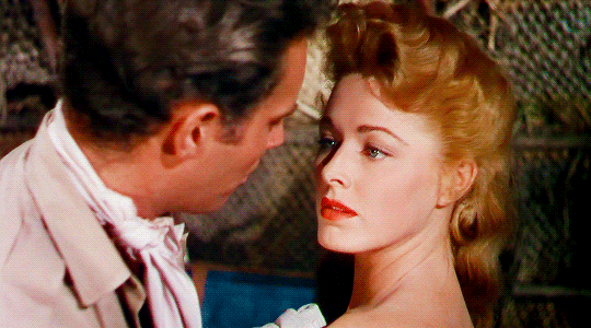 Charlton Heston i Eleanor Parker w filmie "Naga dżungla" (1954)