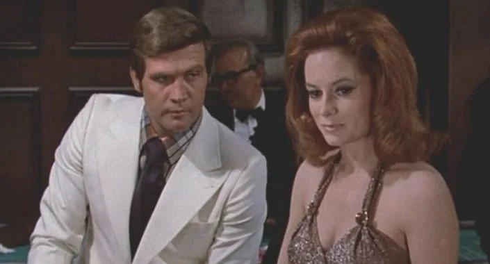 Lee Majors & Luciana Paluzzi w filmie "The Solid Gold Kidnapping" (1973)