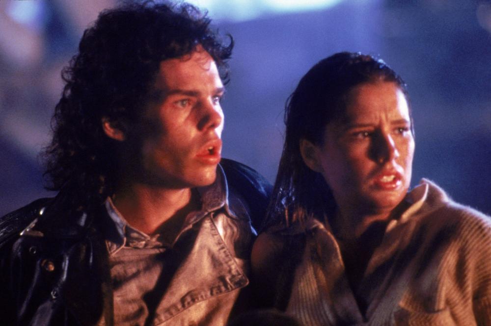 THE BLOB, from left: Kevin Dillon, Shawnee Smith, 1988. ©Tri-Star