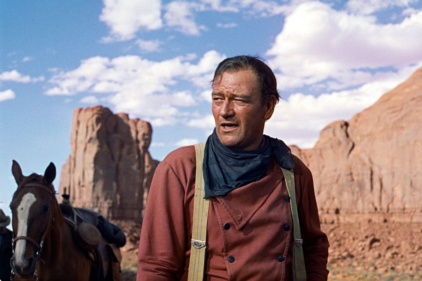 John Wayne jako Ethan Edwards w filmie "Poszukiwacze" (1956)