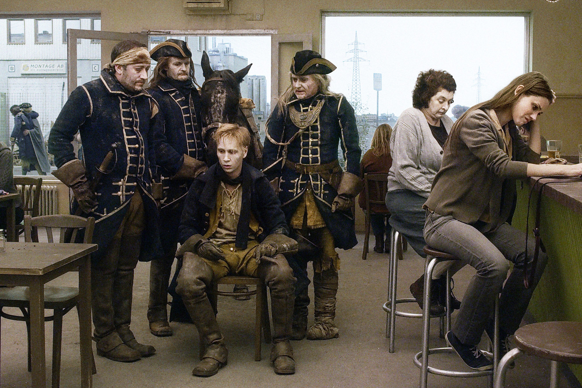 A PIGEON SAT ON A BRANCH