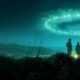 Two men in long coats and fedora hats stand on a rocky hill, looking toward a valley city and distant mountains under a teal, glowing sky ring.