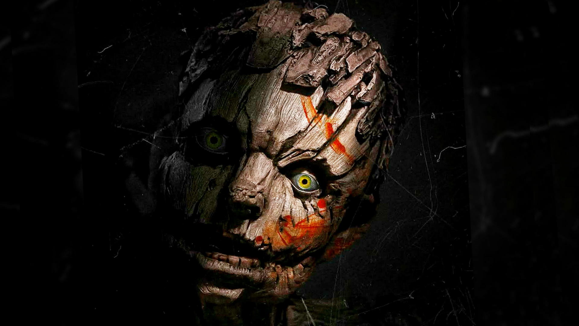 Close-up of a cracked, bark-like zombie face with yellow eyes and orange markings in darkness.