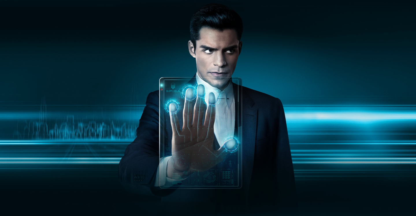 Businessman in a dark suit extends his hand toward a glowing blue holographic touchscreen.