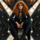 Kaleidoscopic collage of a red-haired woman in a dark coat and sunglasses posed on an escalator in a subway station
