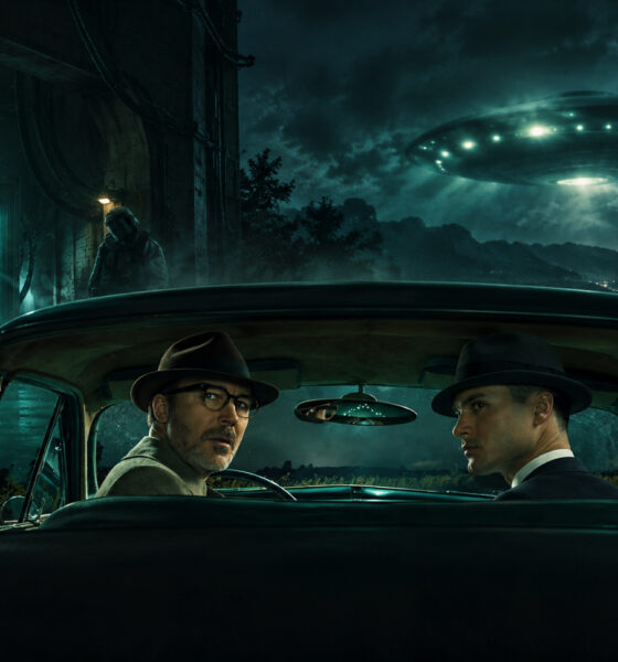 Two men in a vintage car at night look toward a distant UFO hovering over a foggy valley as suited figures monitor a glowing chamber with an alien inside.