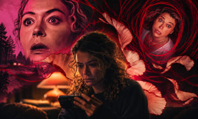 Woman with curly hair on a couch, intently looking at her phone, surrounded by eerie red-toned faces and swirling shapes in a dramatic background.